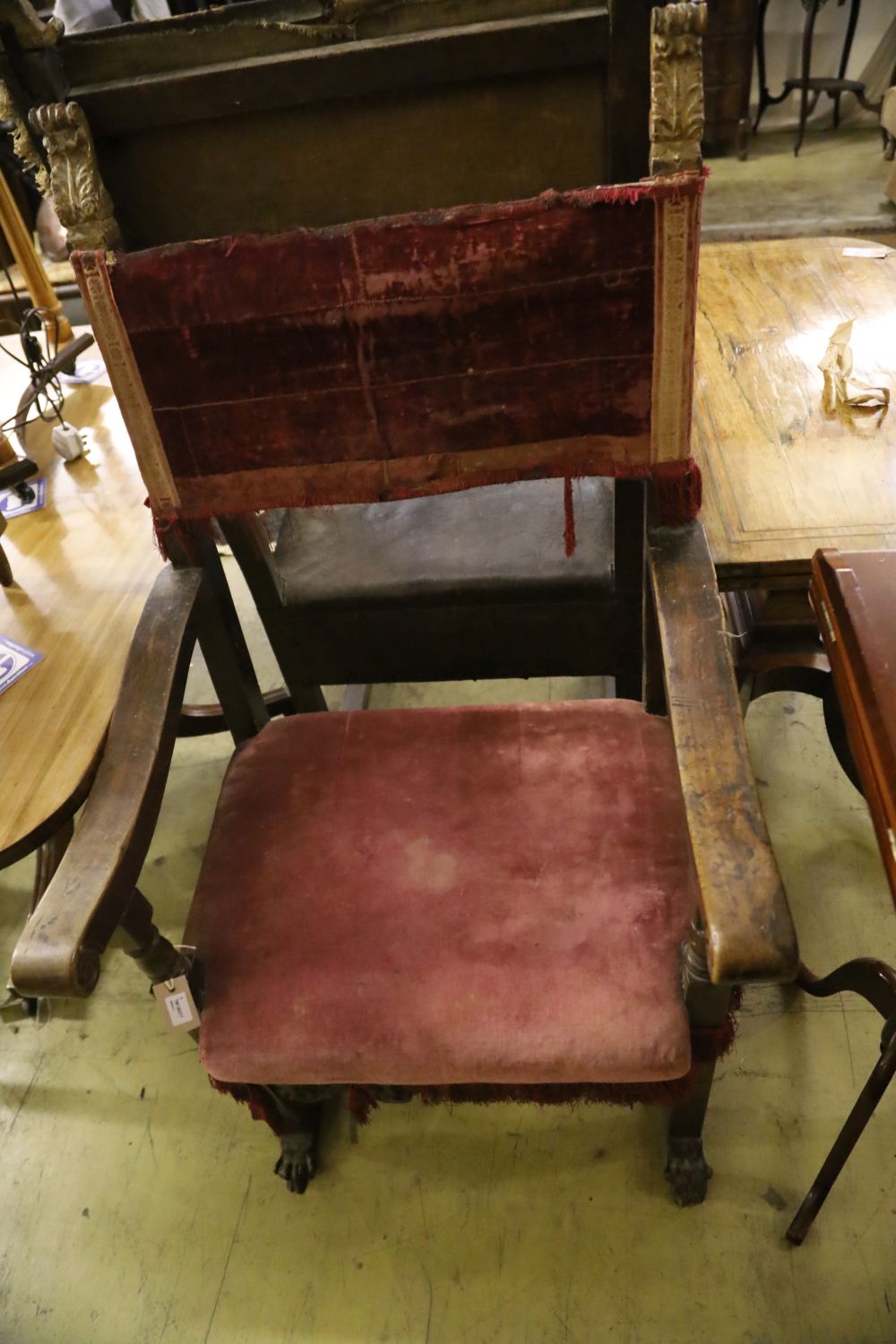 Two carved walnut Italian Renaissance style open armchairs,